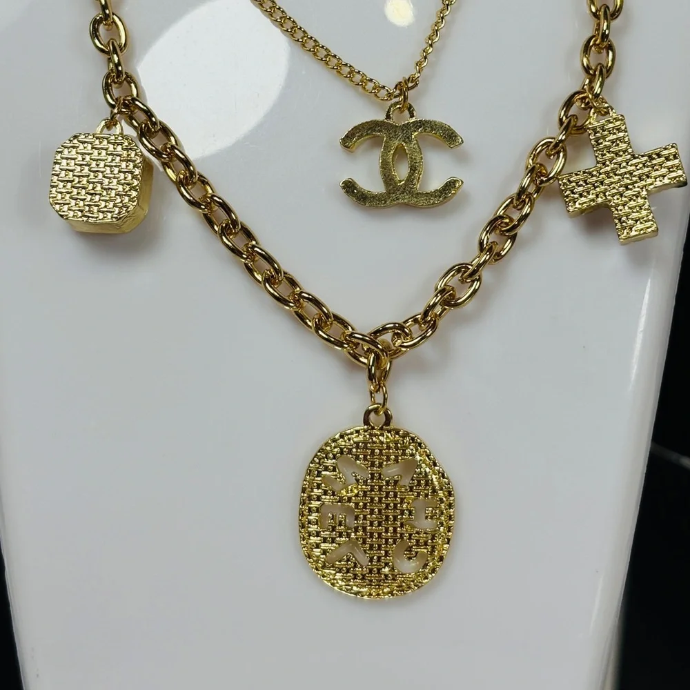 A-1FN-4: NECKLACE: Double Gold-Tone Featuring Dazzling Monogram Charms, NWOT